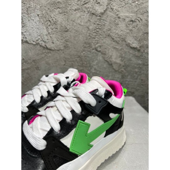 Close-up view of laces and green arrow motif on Off-White Sponge Mid-Top Trainers in off-white and black