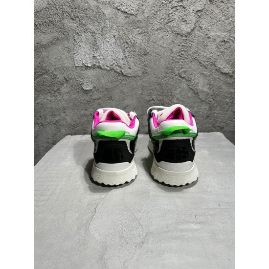 Rear view highlighting pink lining and heel tabs on Off-White Sponge Mid-Top Trainers in off-white and black