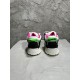 Rear view highlighting pink lining and heel tabs on Off-White Sponge Mid-Top Trainers in off-white and black