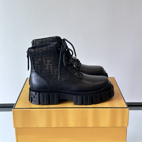 Angled side view of black Fendi Men's FF Jacquard And Leather Biker Boots on box Angled side view of black Fendi Men's FF Jacquard And Leather Biker Boots resting on a branded yellow box