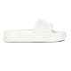 Profile view of Christian Louboutin white spiked pool slides