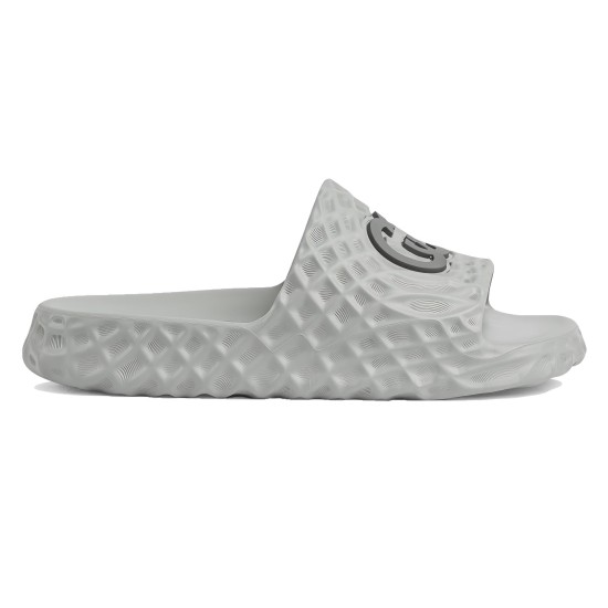 Side profile view of Gucci grey rubber slide sandals showing textured midsole Gucci slide sandals in grey rubber shown from a clean side profile