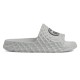 Side profile view of Gucci grey rubber slide sandals showing textured midsole Gucci slide sandals in grey rubber shown from a clean side profile