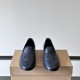 Frontal view of Billionaire Men's Blue Crest Leather Loafers displaying the crest motif on each vamp in blue and dark blue