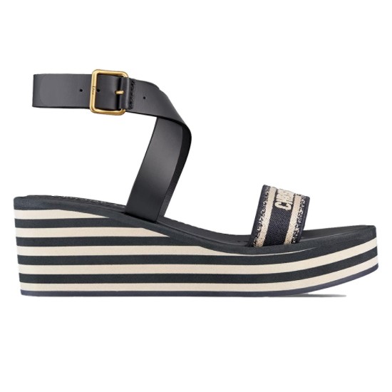 Dior Dway Wedge Sandals Side View in blue Side profile of Dior Dway Wedge Sandals in deep blue embroidered cotton showing striped platform and ankle strap