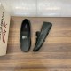 Dolce & Gabbana Men's Green Deerskin Leather Driver Shoes Display View Dolce & Gabbana Men's Green Deerskin Leather Driver Shoes displayed on wooden surface alongside shoebox