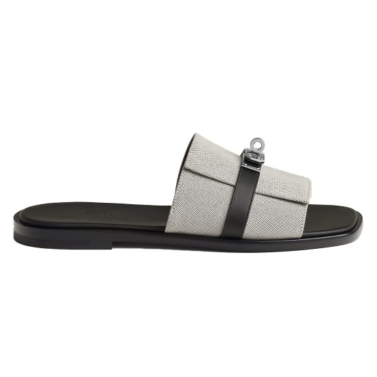 Side profile of Hermes Gabriel grey and black sandals showing canvas strap and metal clasp