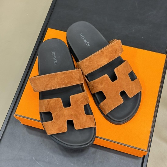 Hermes Brown Suede Sandals Overhead View in brown and white Top down view of brown suede sandals resting on an orange box in brown and white