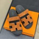 Hermes Brown Suede Sandals Overhead View in brown and white Top down view of brown suede sandals resting on an orange box in brown and white