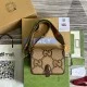 Men's Top-Down Presentation View with Unboxed Accessories Men's Detailed top-down view of the brown jumbo GG canvas shoulder bag and its branded presentation boxes