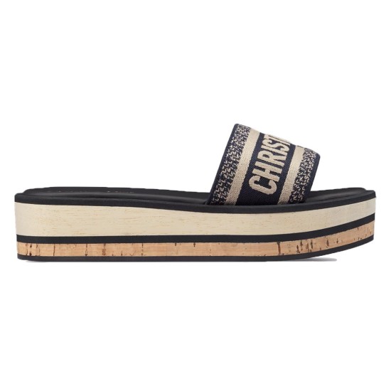 Dior Platform Slides Profile View in white and brown Side profile view of Dior Platform Slides in white and brown showing the layered cork sole and embroidered strap