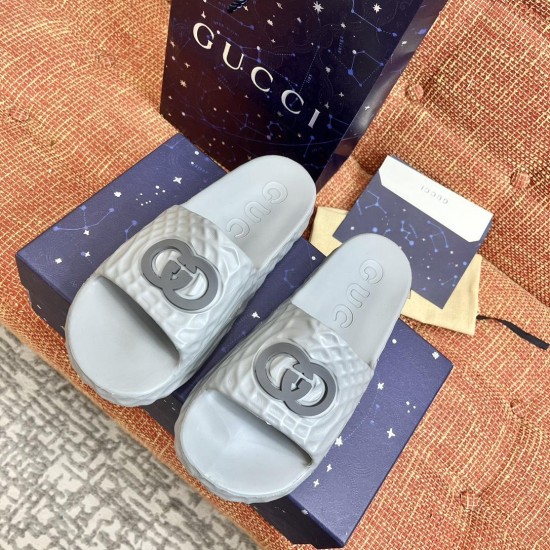 Gucci Slide Sandal Overhead View in Grey Top-down overhead view of the grey Gucci slide sandals showcasing the upper strap design