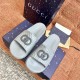 Gucci Slide Sandal Overhead View in Grey Top-down overhead view of the grey Gucci slide sandals showcasing the upper strap design