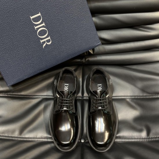 Dior Men's Black Polished Leather Derby Shoes Front Angle Front overhead view of Dior men's black polished leather derby shoes next to a designer box