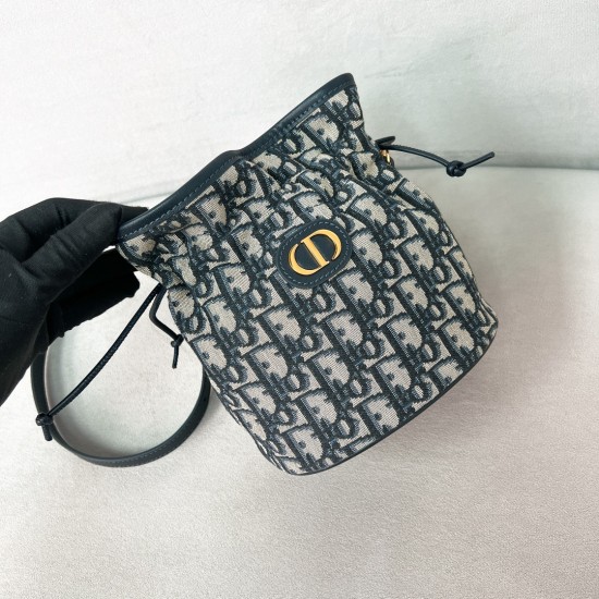 replica 30 MONTAIGNE MINI BUCKET BAG WITH DRAWSTRING BLUE OBLIQUE JACQUARD UK