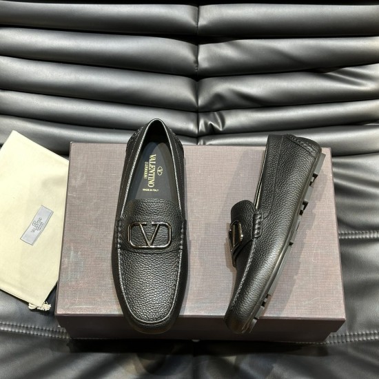 Valentino Men's Black Grained Leather Loafers Box View Valentino Men's Black Grained Leather Loafers displayed alongside packaging and dust bag