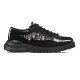 Side Profile of Dior Men's Black and Beige Derby Shoe Side profile view of Dior men's black polished calfskin derby shoe featuring beige and black jacquard panels