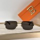 Balmain Men's Sunglasses Front Profile with Case Balmain men's sunglasses front view displayed with an orange branded presentation case