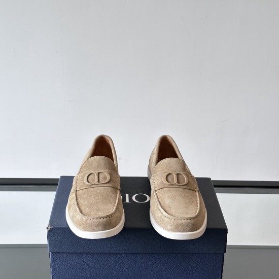 Front view of Dior Men's Granville Beige Suede Loafers highlighting the front apron stitching and tonal hardware in beige and white