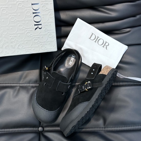 Dior Black Nubuck Calfskin Tokio Mules Box Presentation Top angled view of the black nubuck calfskin mules displayed next to a branded presentation box and dust bag