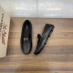 Dolce & Gabbana Men's Black Driver Shoes Pair Display Dolce & Gabbana Men's Black Grainy Leather Plaque Driver Shoes top and side pair angle