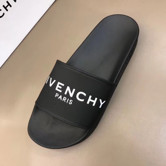 Givenchy Black Pool Slide Overhead in black and white Top down perspective of a single Givenchy black pool slide highlighting the wide strap and contoured footbed in black and white