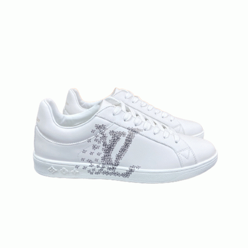Full Pair Presentation of L White Leather Low Top Trainers Full pair presentation of L white leather low top trainers against a plain background