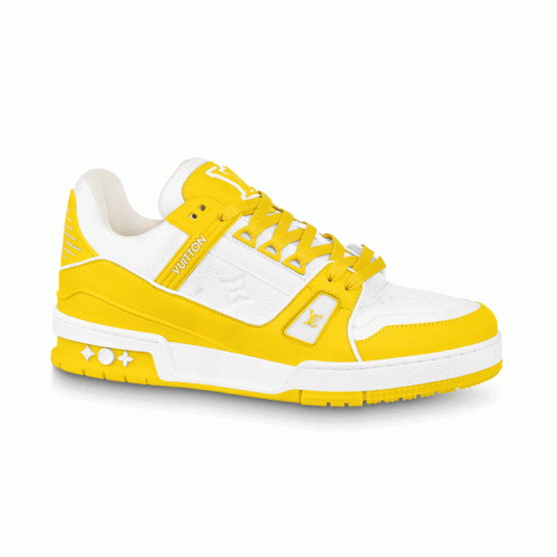 Studio Background Profile - L Trainer Low Top Yellow And White Leather Trainers Clean studio profile view of L Trainer Low Top Yellow And White Leather Trainers on a white background