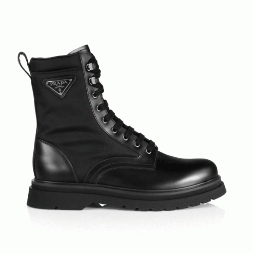 Prada Brushed Leather And Nylon Boot Studio Shot in black and white Full side view of black Prada brushed leather and nylon boot with silver speed hooks in black and white